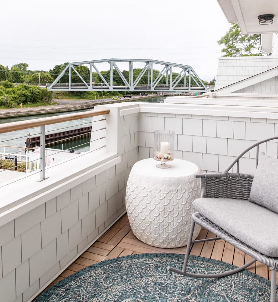 Hamptons boathouse patio decor designed by Annette Jaffe Interiors