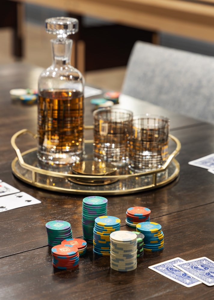 Sands Point basement game room table by Annette Jaffe Interiors
